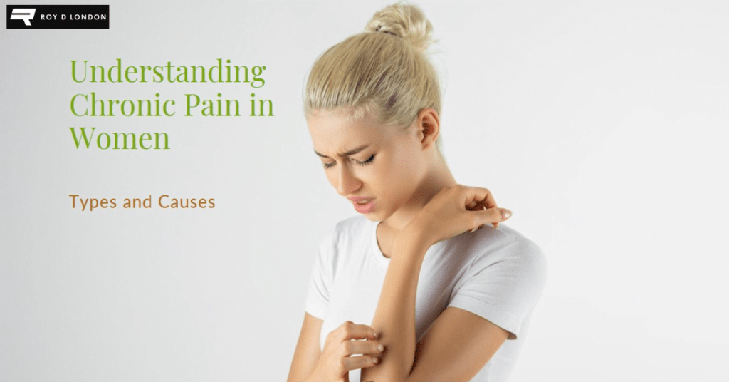 young woman looking down at her left elbow with a painful expression.